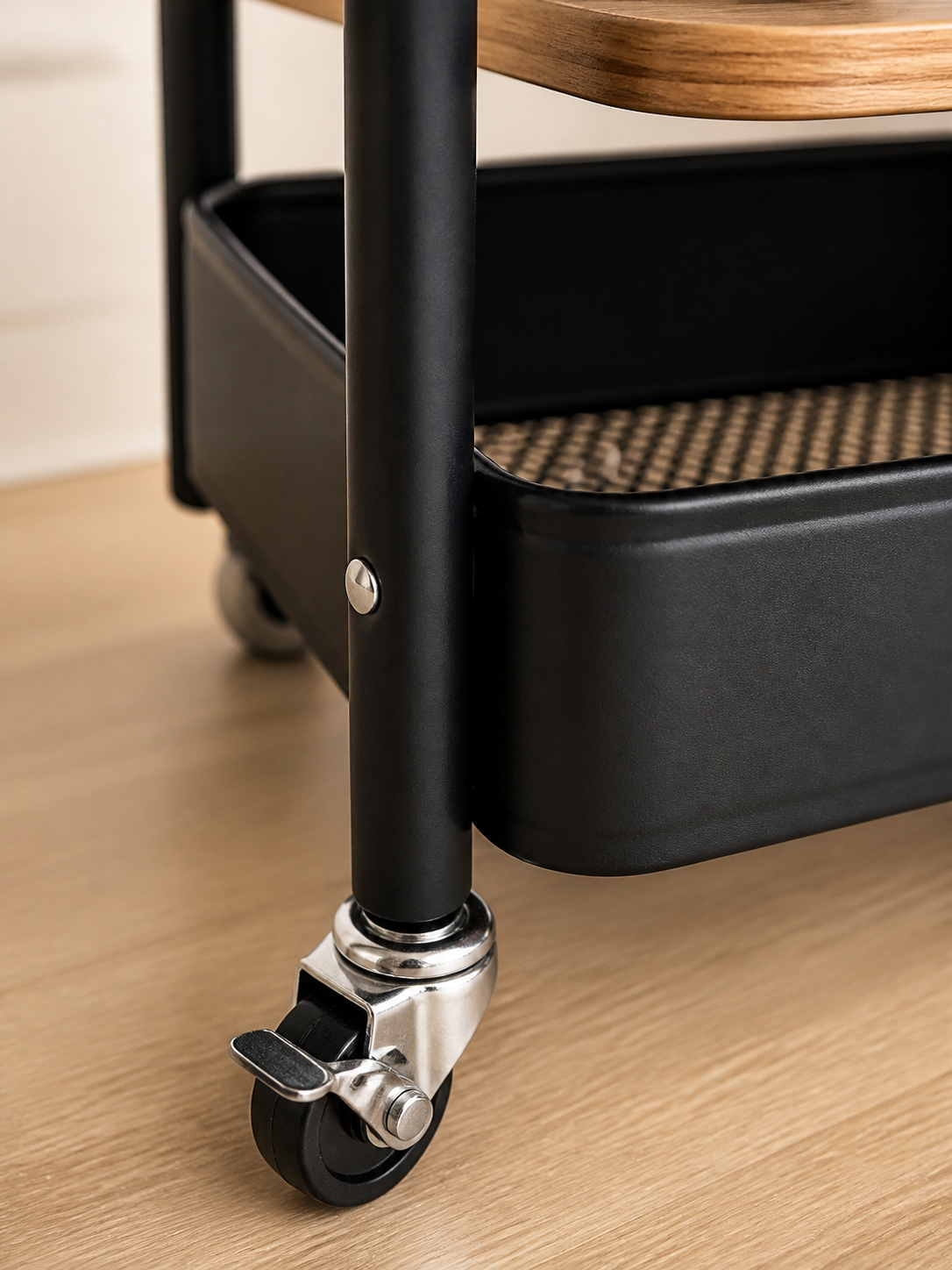 Three-tier rolling cart locking caster detail