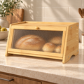 Fluted-door bamboo bread box on a kitchen counter