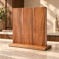 Magnetic acacia knife block on a cream stone kitchen counter